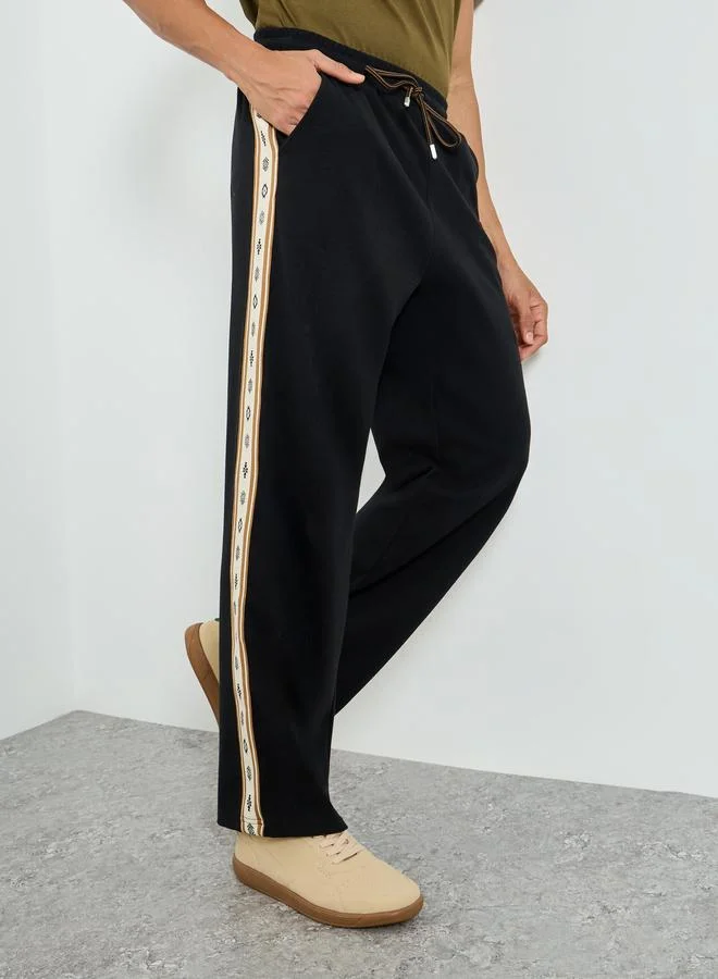 Styli black Men Black Relaxed Joggers with Side Tape for Men | Best Price UAE